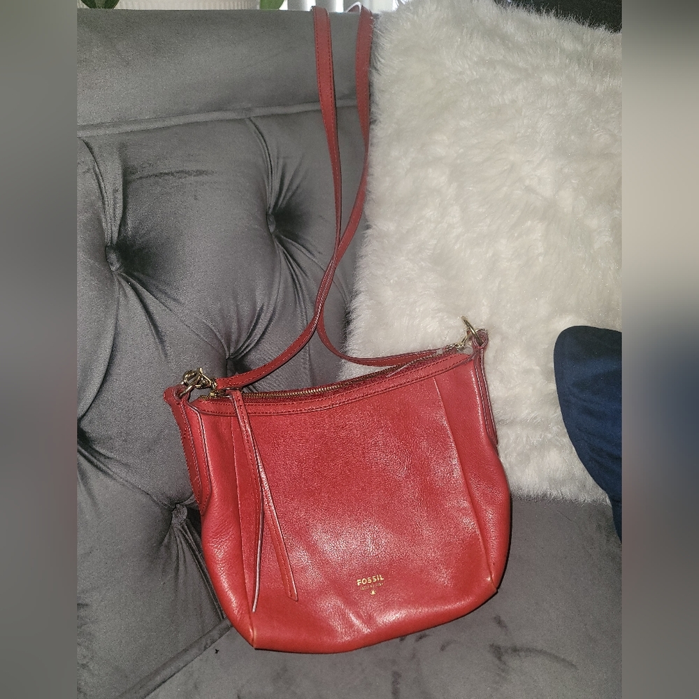 Red genuine leather Fossil crossbody bag with some wear on edges see pic
